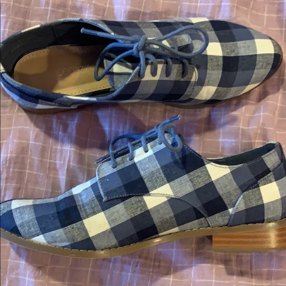 Lightly worn blue and white plaid pattern shoes